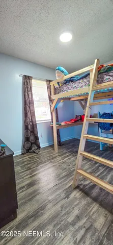 a view of an empty room with stairs