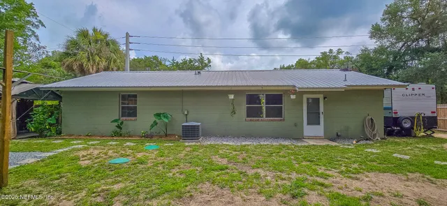 a view of an outdoor sitting area with furniture