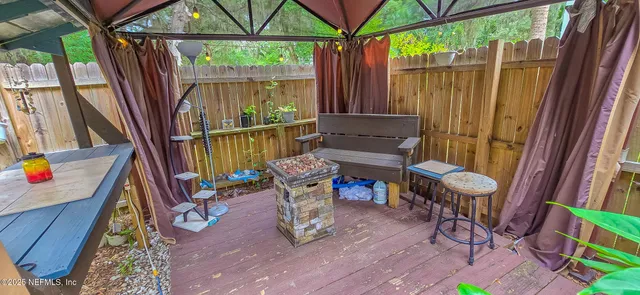 a view of a backyard with a small cabin