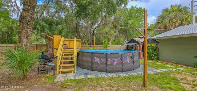 a view of outdoor space and yard