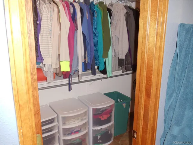 a dining room with a table and chairs