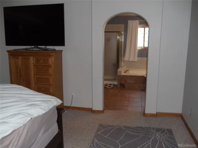 a view of a livingroom from a hallway