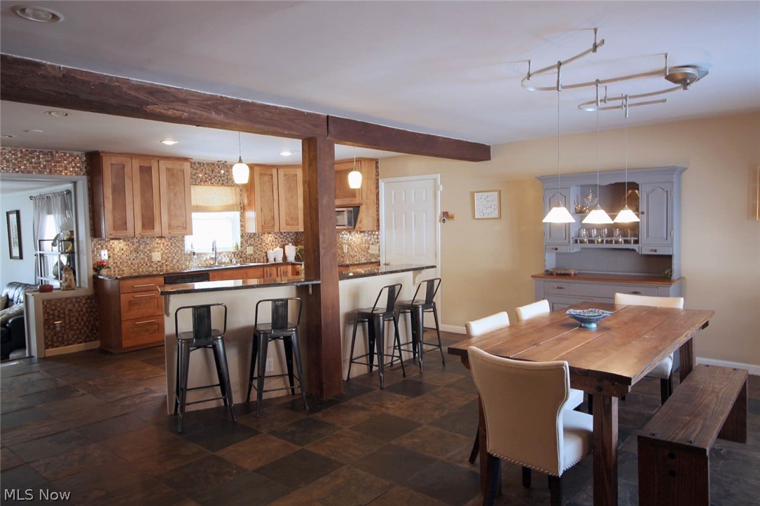 Beautifully renovated open concept kitchen w/granite counters.