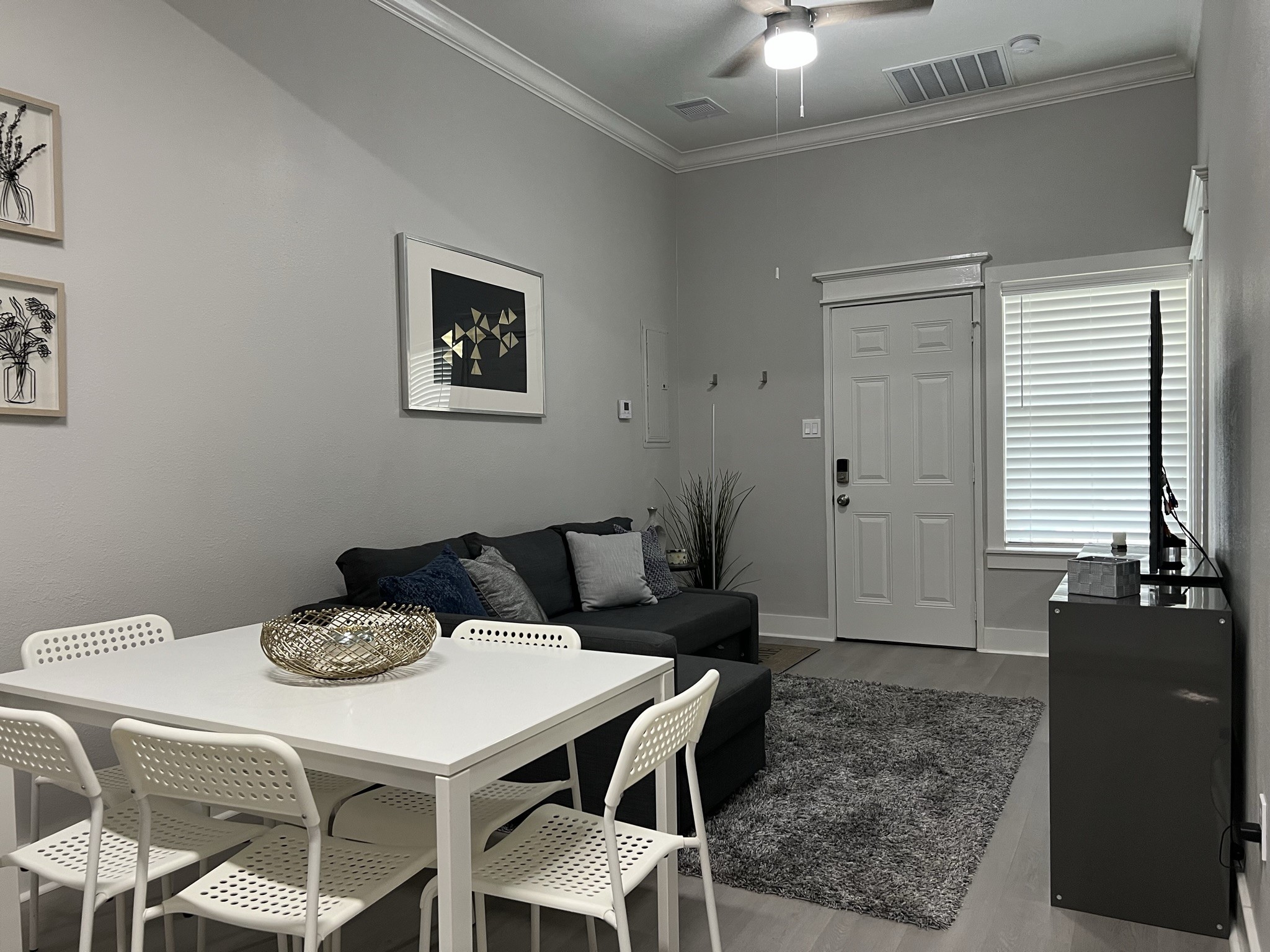 220 Redan Street, Unit A Houston, TX 77009 - Photo 12 of 22 a view of a dining room with furniture and window