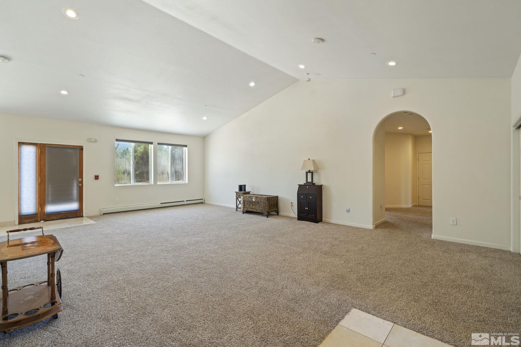 201 Rhodes Road Reno, NV 89521 - Photo 14 of 38 a view of a livingroom with a staircase