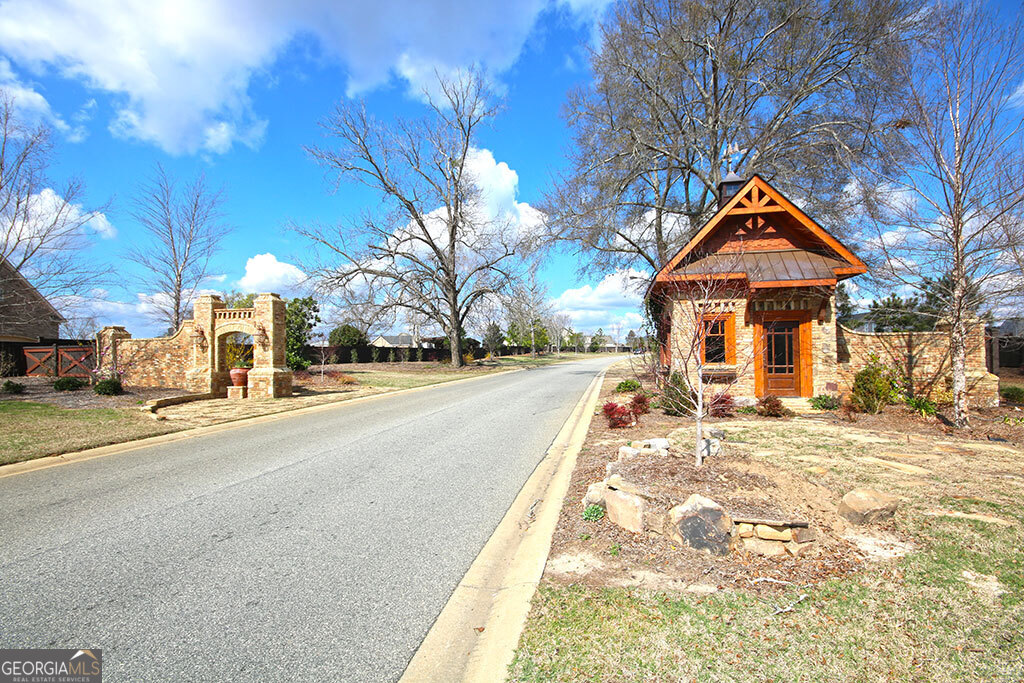 607 Bristleleaf Path Kathleen, GA 31047 - Photo 2 of 4 a front view of a house with a yard