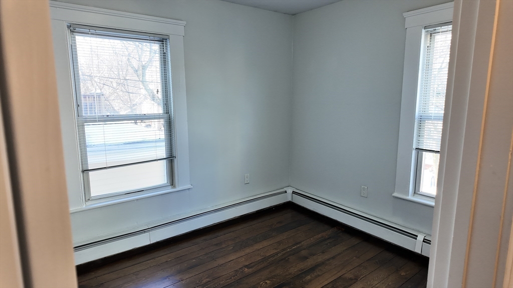 294 Windsor Street, Unit 2 Cambridge, MA 02139 - Photo 6 of 13 a view of a room that has a window