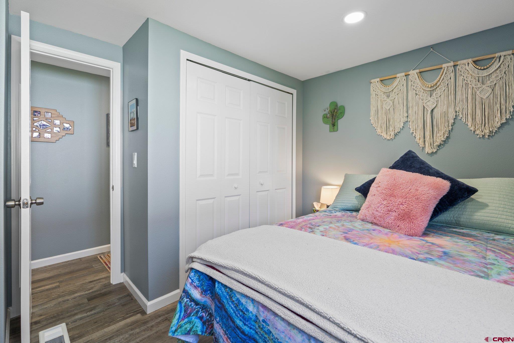 31722 Highway 550, Unit 55 Durango, CO 81301 - Photo 11 of 20 a bedroom with a bed and a window