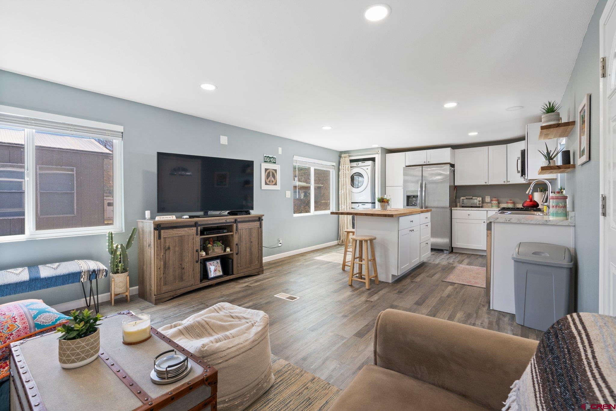 31722 Highway 550, Unit 55 Durango, CO 81301 - Photo 16 of 20 a living room with furniture and a flat screen tv