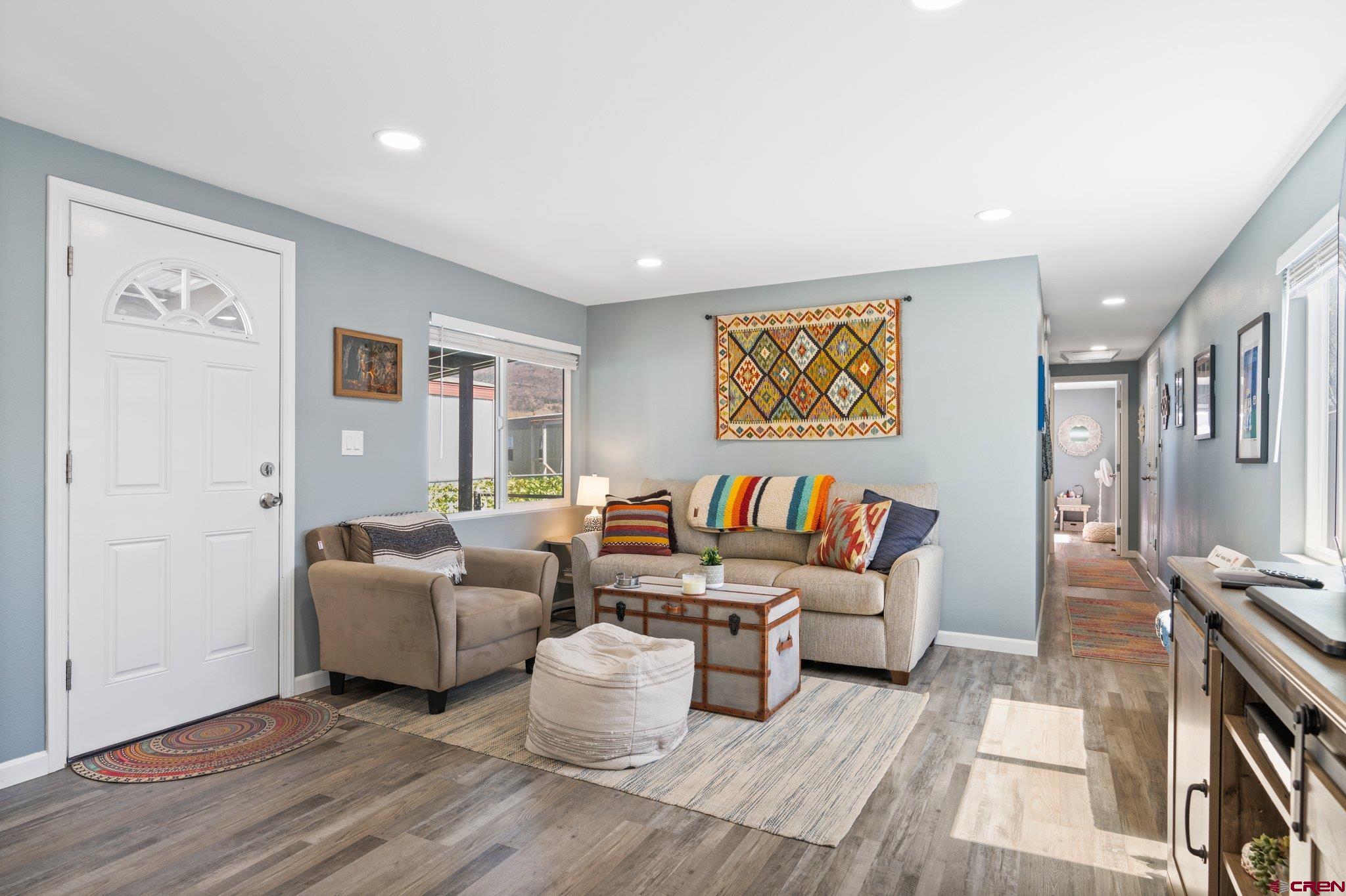 31722 Highway 550, Unit 55 Durango, CO 81301 - Photo 8 of 20 a living room with furniture and wooden floor