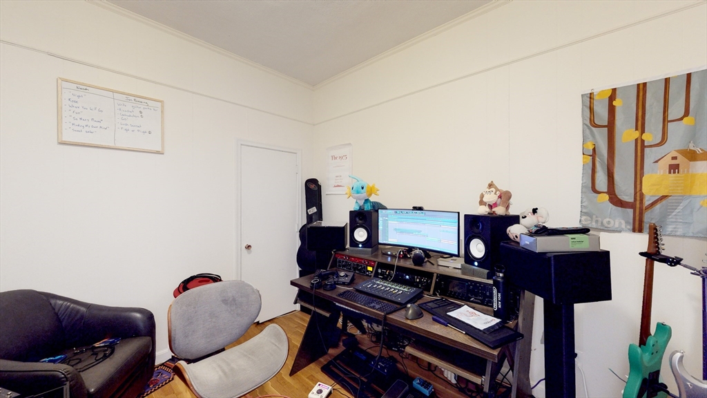 513 Beacon Street, Unit 6 Boston, MA 02215 - Photo 7 of 8 a view of a workspace with furniture