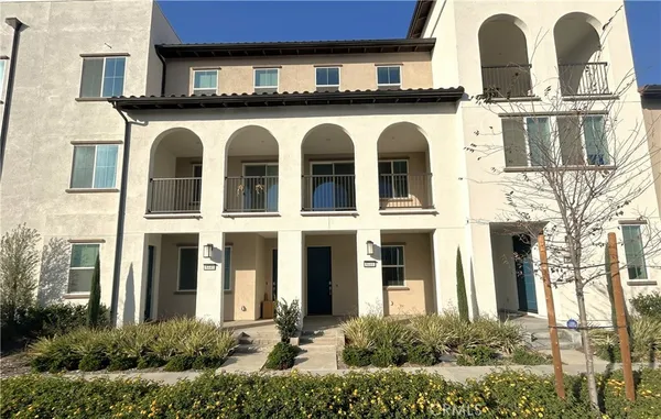 a front view of a multi story residential apartment building