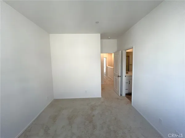 a bathroom with a toilet and a sink