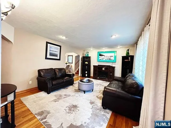 a living room with furniture and a couch