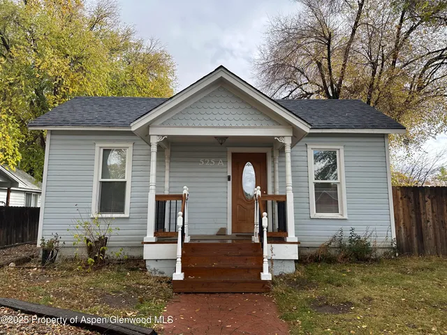 a front view of house with yard