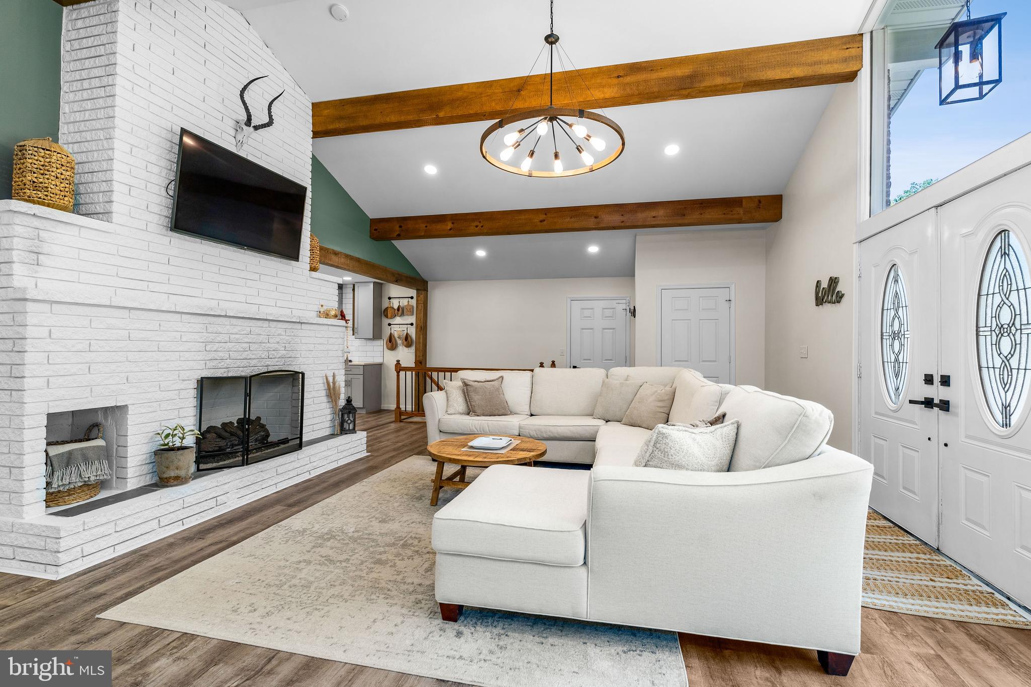 748 Principio Road Port Deposit, MD 21904 - Photo 6 of 43 STUNNING LIVING ROOM WITH EXPOSED BEAMS