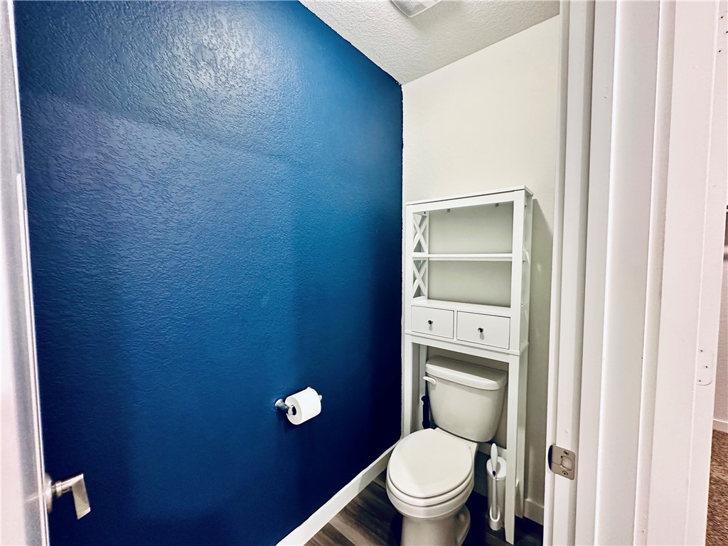 1118 Amistad Loop College Station, TX 77845 - Photo 14 of 26 a bathroom with a toilet