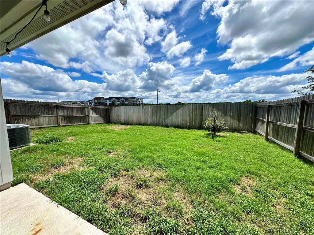 1118 Amistad Loop College Station, TX 77845 - Photo 20 of 26 a view of a backyard with a garden