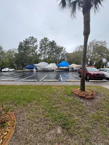 a view of swimming pool with sitting area