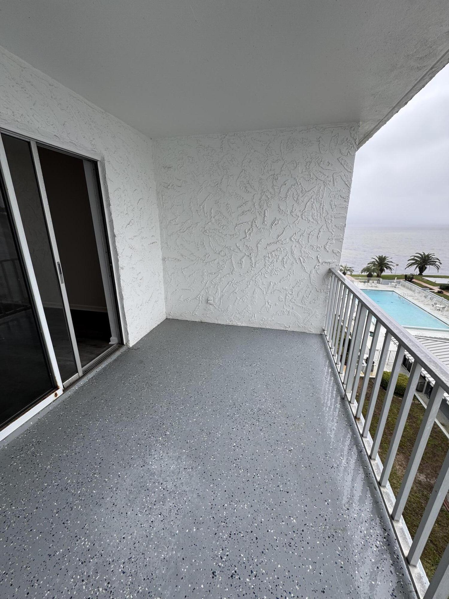 3857 Indian Trail, Unit 507 Destin, FL 32541 - Photo 3 of 33 a view of an empty room with stairs