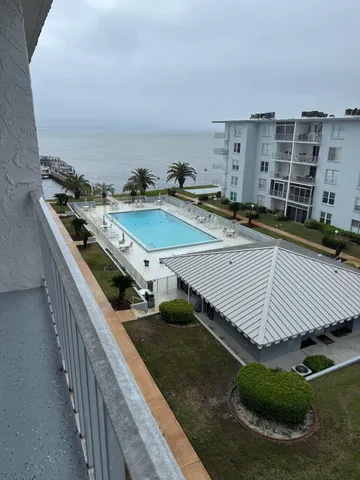 a view of a swimming pool with outdoor space