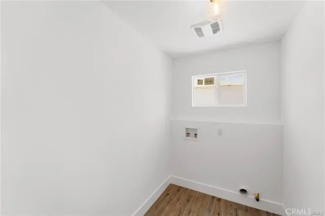 a view of small space with wooden floor