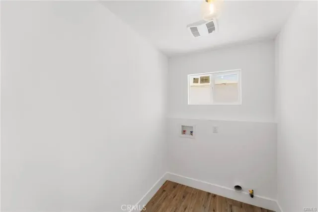 a view of small space with wooden floor