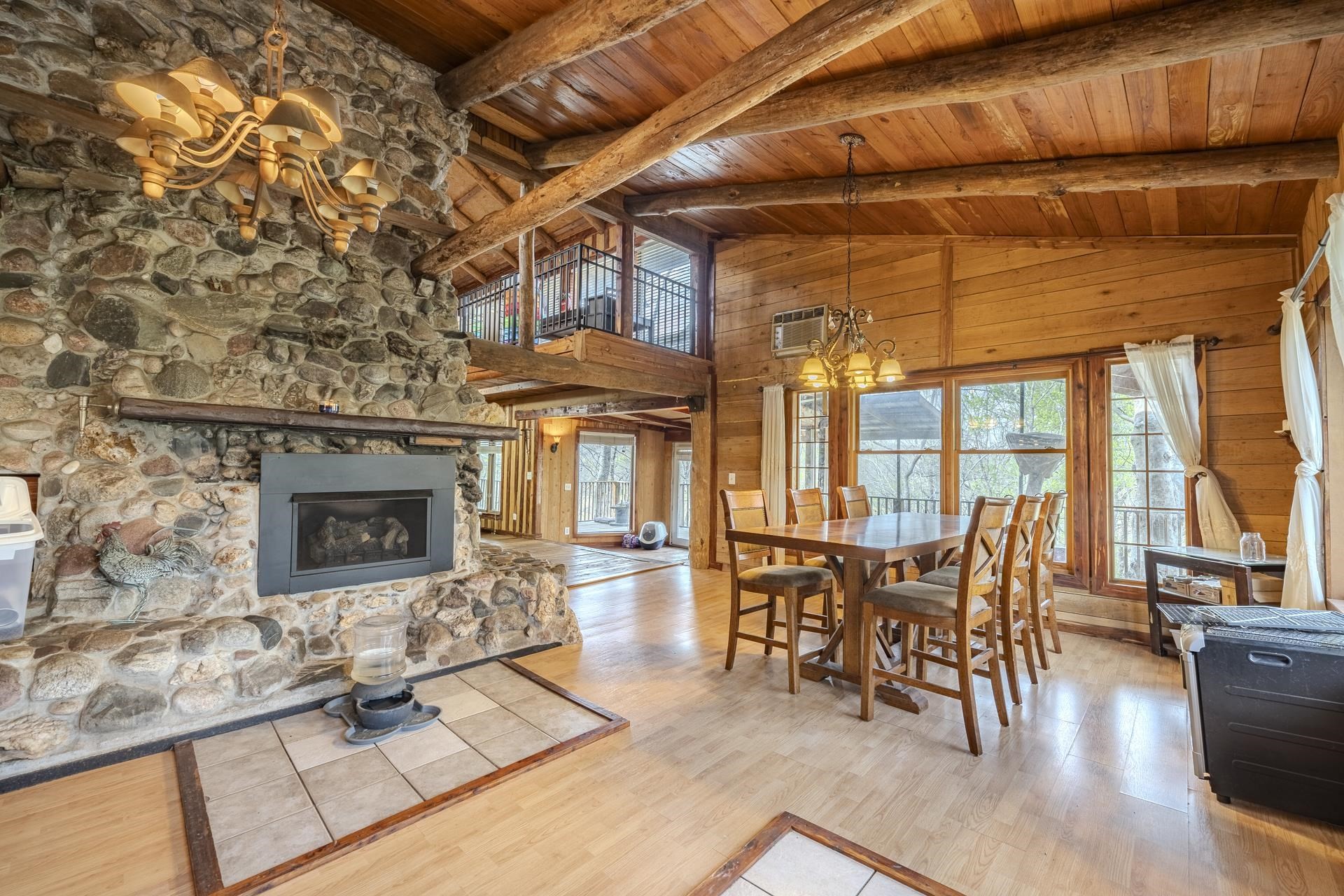 330 Arrowhead Way Savannah, TN 38372 - Photo 9 of 40 a living room with furniture a fireplace and wooden floor