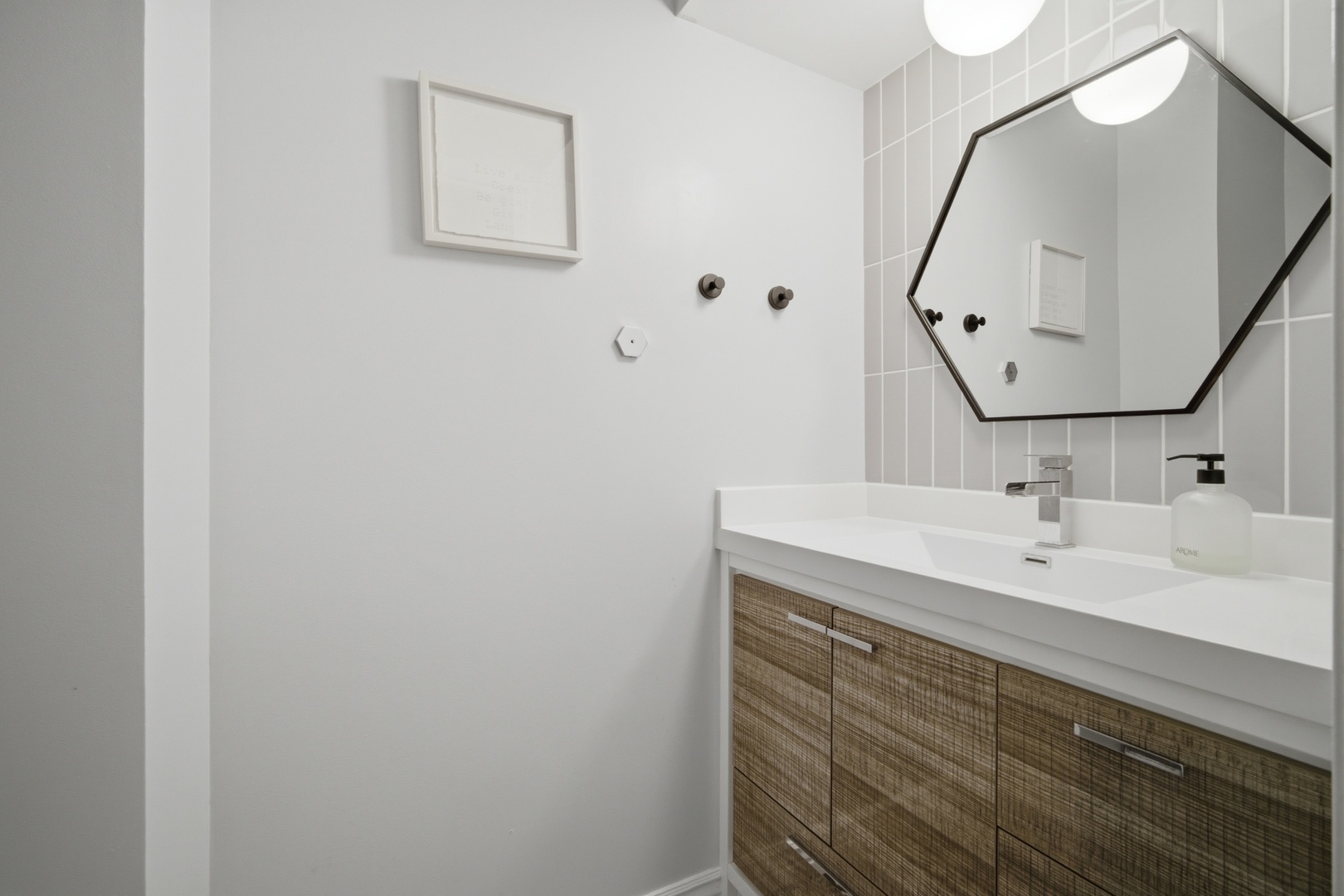 2831 Farmington Road Northbrook, IL 60062 - Photo 16 of 33 a bathroom with a sink and a mirror