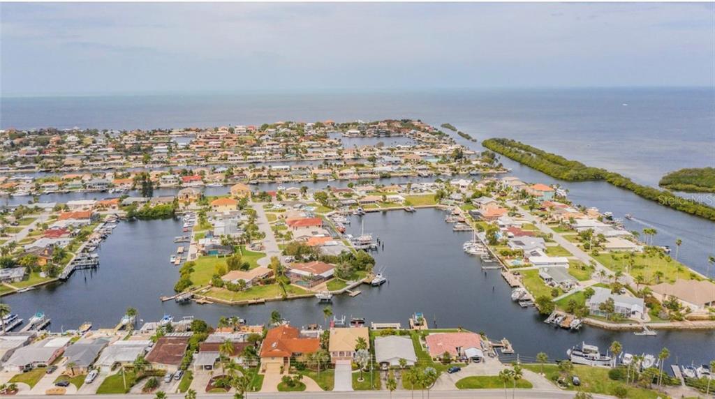 3779 Floramar Terrace New Port Richey, FL 34652 - Photo 2 of 56 10 minutes boat ride to the open gulf. Boating club in neighborhood is very active.