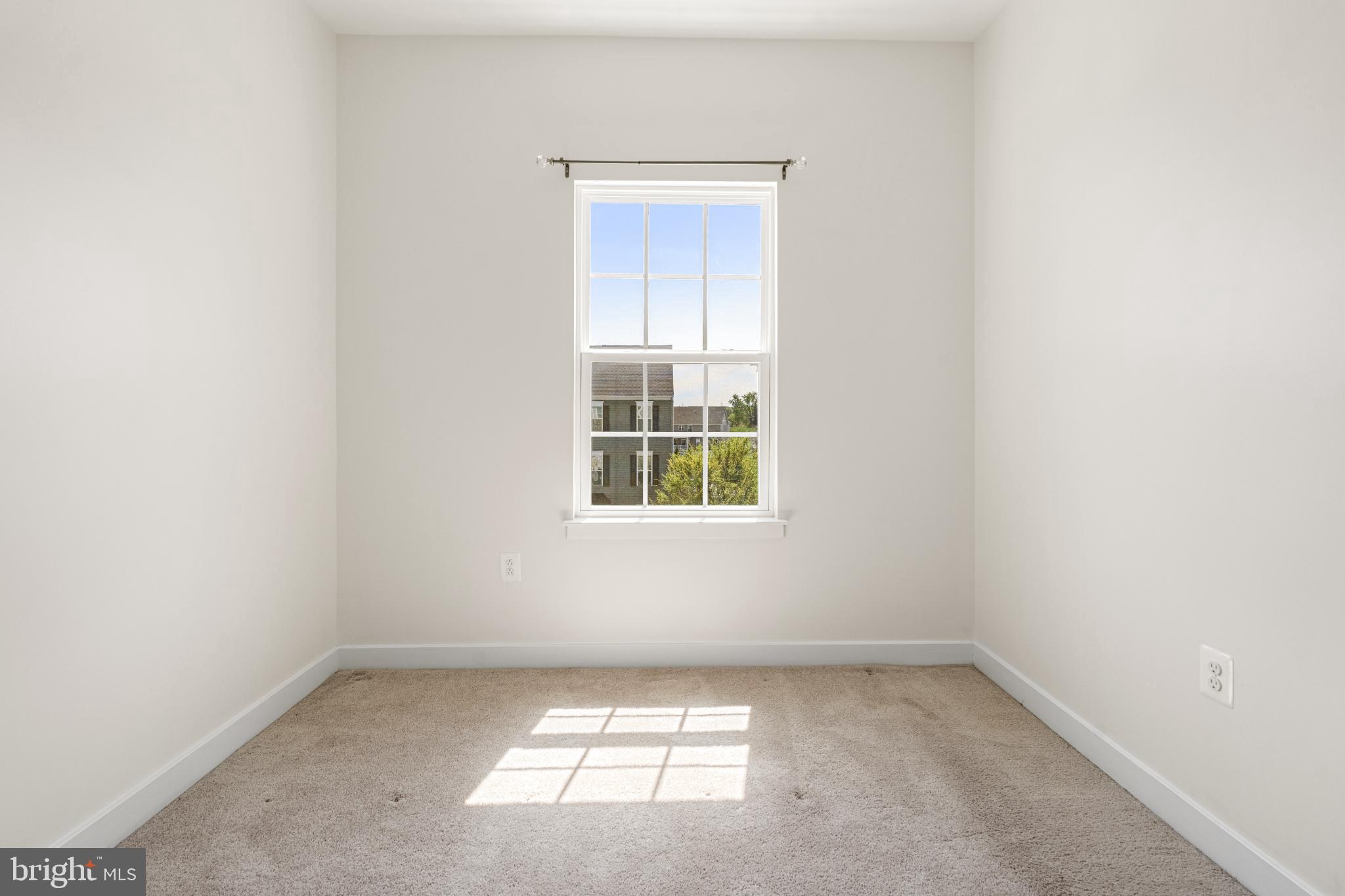 6510 Ballenger Run Boulevard Frederick, MD 21703 - Photo 13 of 18 an empty room with a window