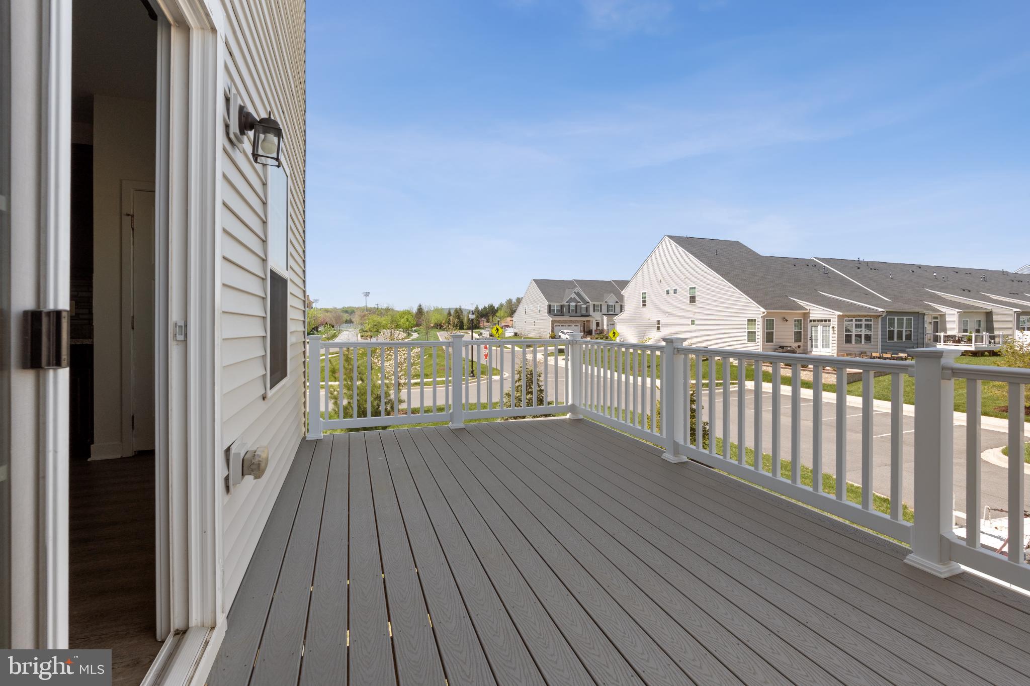 6510 Ballenger Run Boulevard Frederick, MD 21703 - Photo 8 of 18 a view of balcony with wooden floor