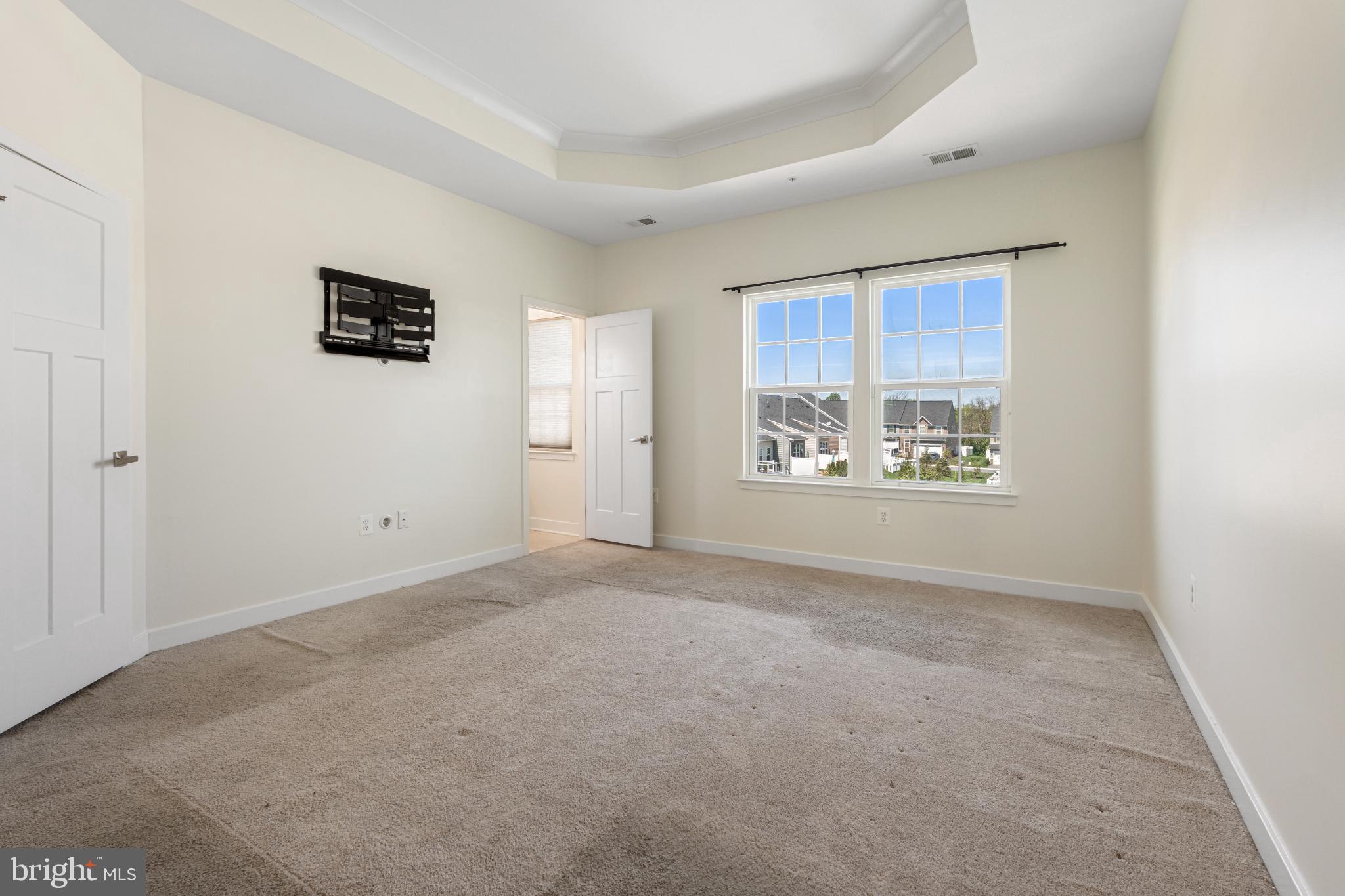 6510 Ballenger Run Boulevard Frederick, MD 21703 - Photo 10 of 18 an empty room with windows