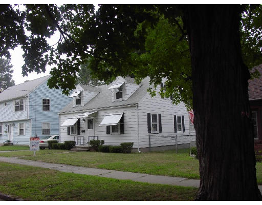 178 Ellsworth Avenue Springfield, MA 01118 - Photo 1 of 1 a front view of a house with a garden