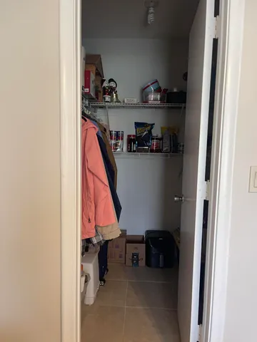 a room with storage and utility