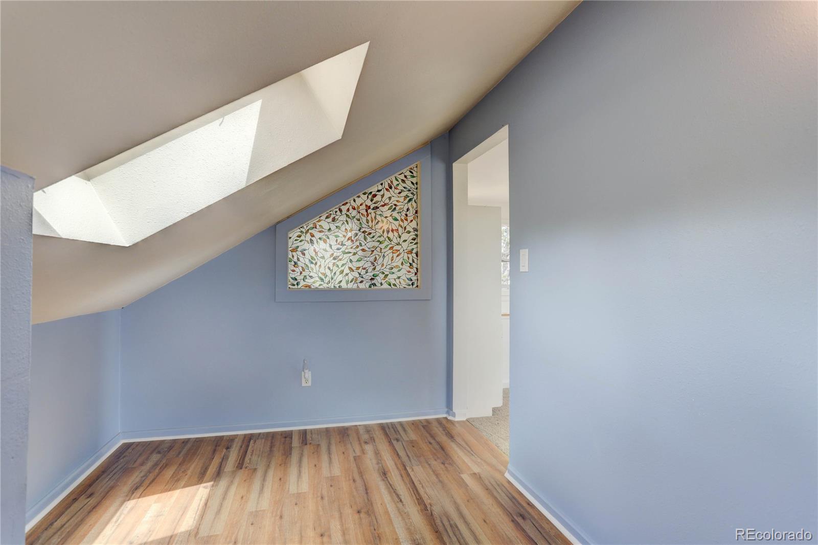 400 Alpine Way Idaho Springs, CO 80452 - Photo 20 of 40 a view of a hallway with wooden floor