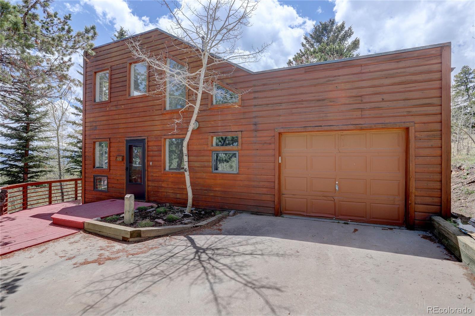 400 Alpine Way Idaho Springs, CO 80452 - Photo 2 of 40 a front view of a house