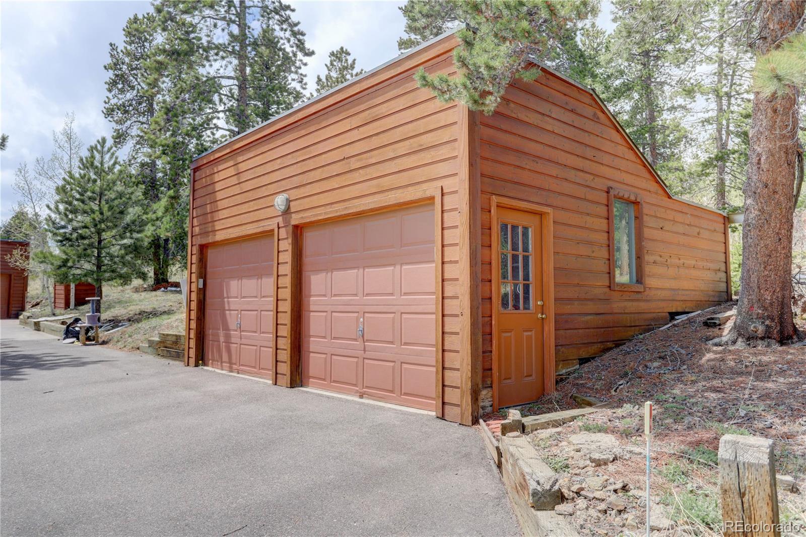 400 Alpine Way Idaho Springs, CO 80452 - Photo 3 of 40 a front view of a house
