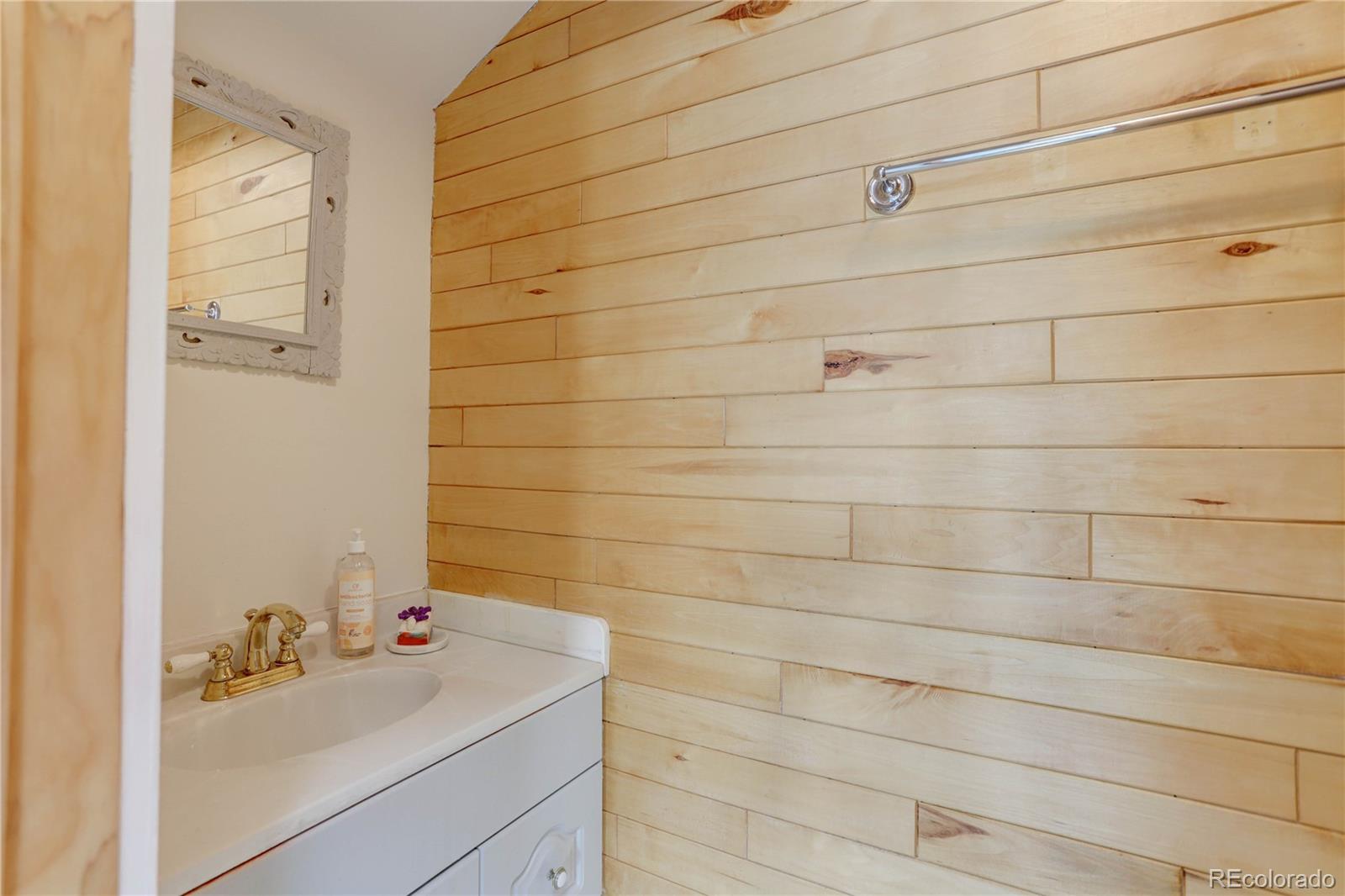 400 Alpine Way Idaho Springs, CO 80452 - Photo 34 of 40 a bathroom with a sink