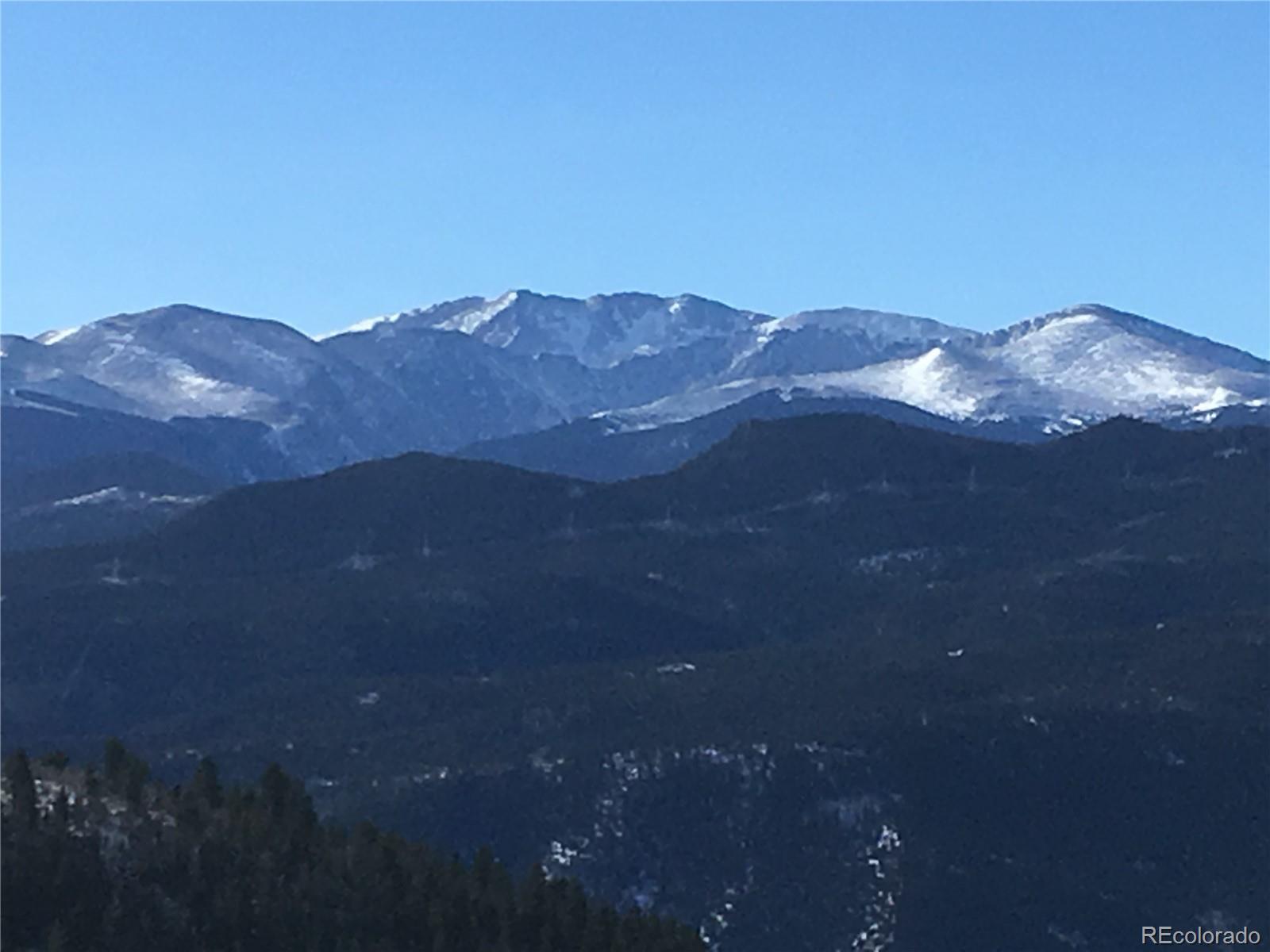 400 Alpine Way Idaho Springs, CO 80452 - Photo 39 of 40 a view of a house with a mountain