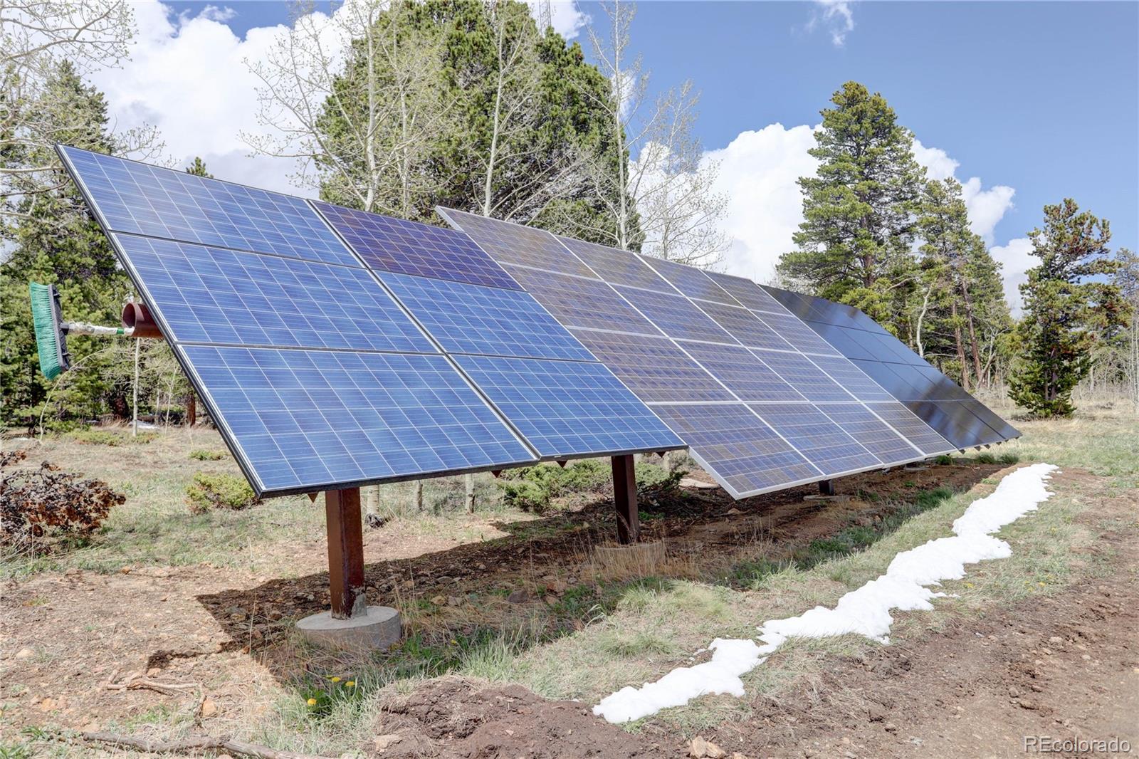 400 Alpine Way Idaho Springs, CO 80452 - Photo 40 of 40 a view of a wooden roof with a bench