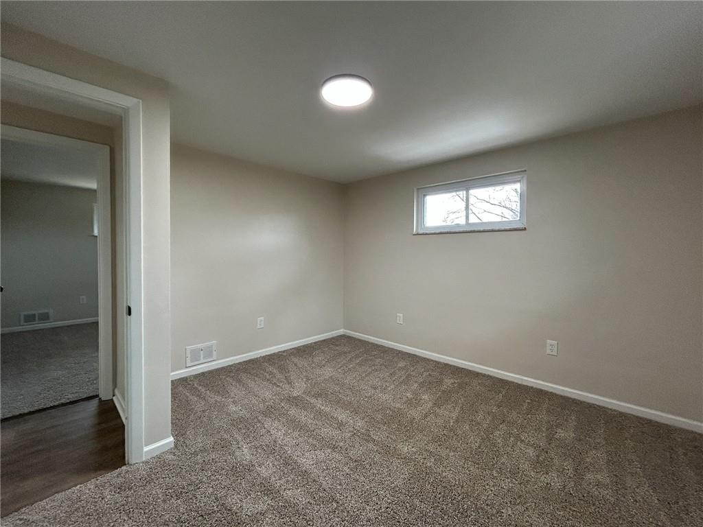 389 Rural Valley Road Claysville, PA 15323 - Photo 18 of 35 an empty room with windows and entrance