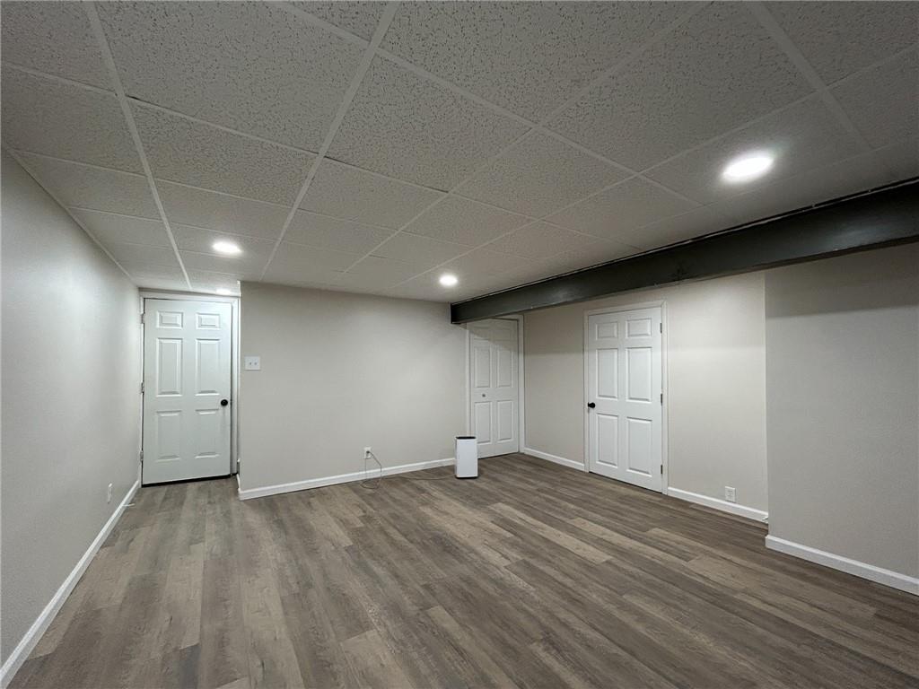 389 Rural Valley Road Claysville, PA 15323 - Photo 27 of 35 an empty room with wooden floor and windows