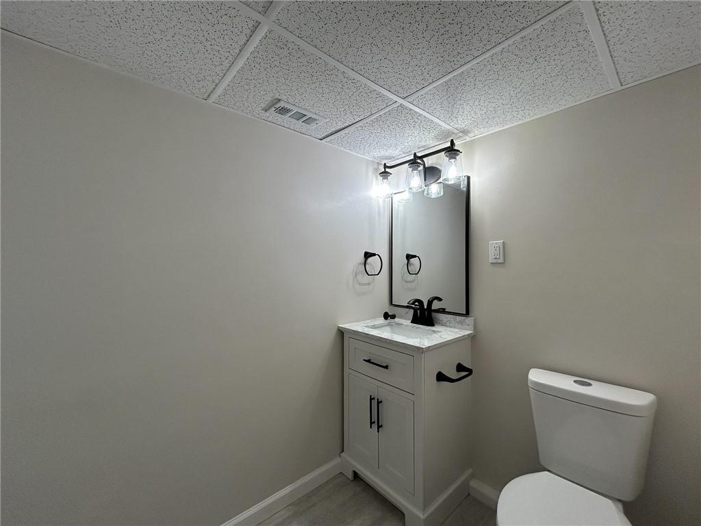389 Rural Valley Road Claysville, PA 15323 - Photo 29 of 35 a bathroom with a sink vanity mirror and toilet