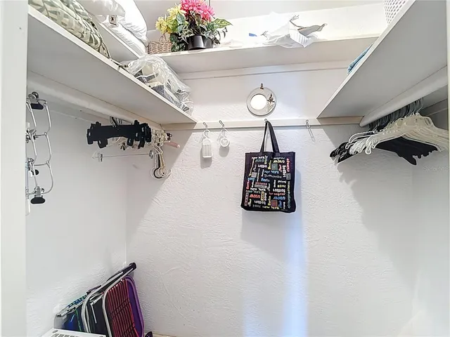 a bathroom with a sink vanity and a mirror