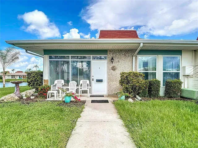 a front view of a house with a patio