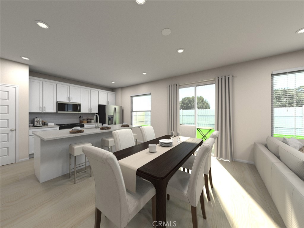 655 Joseph Privado Ontario, CA 91761 - Photo 2 of 13 a living room with furniture and a large window