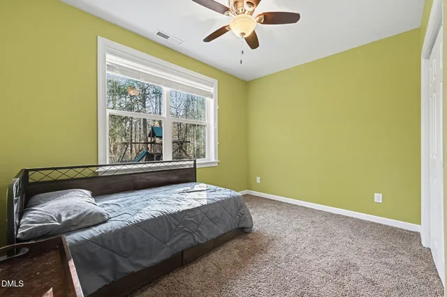 a view of a building with a yard