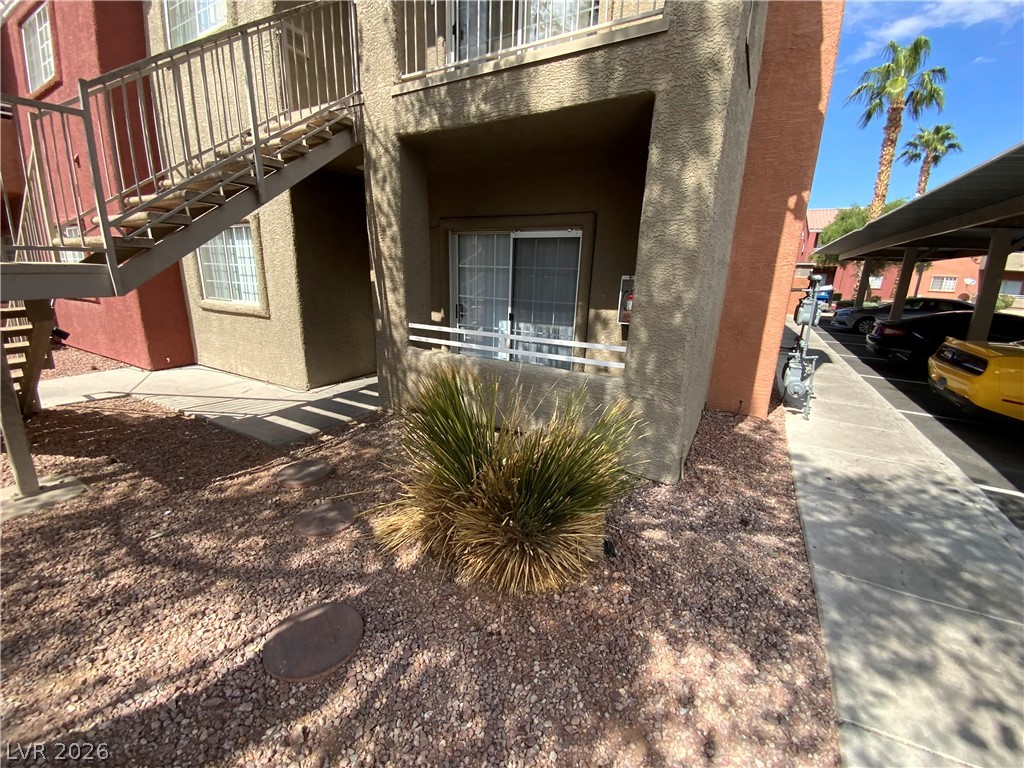 4730 East Craig Road, Unit 1091 Las Vegas, NV 89115 - Photo 2 of 14 Secure covered parking and an external staircase enhance this complex's accessibility.