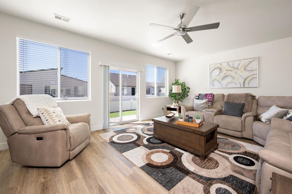 1694 Tungsten Way Fruita, CO 81521 - Photo 5 of 22 a living room with furniture and a large window